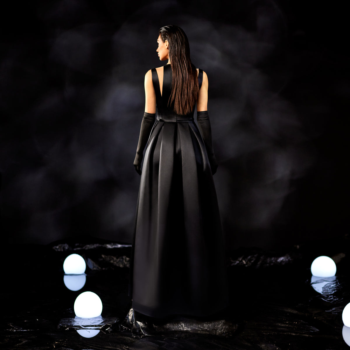 Abdo Aoude — black cutout bodice gown with ball skirt, back view