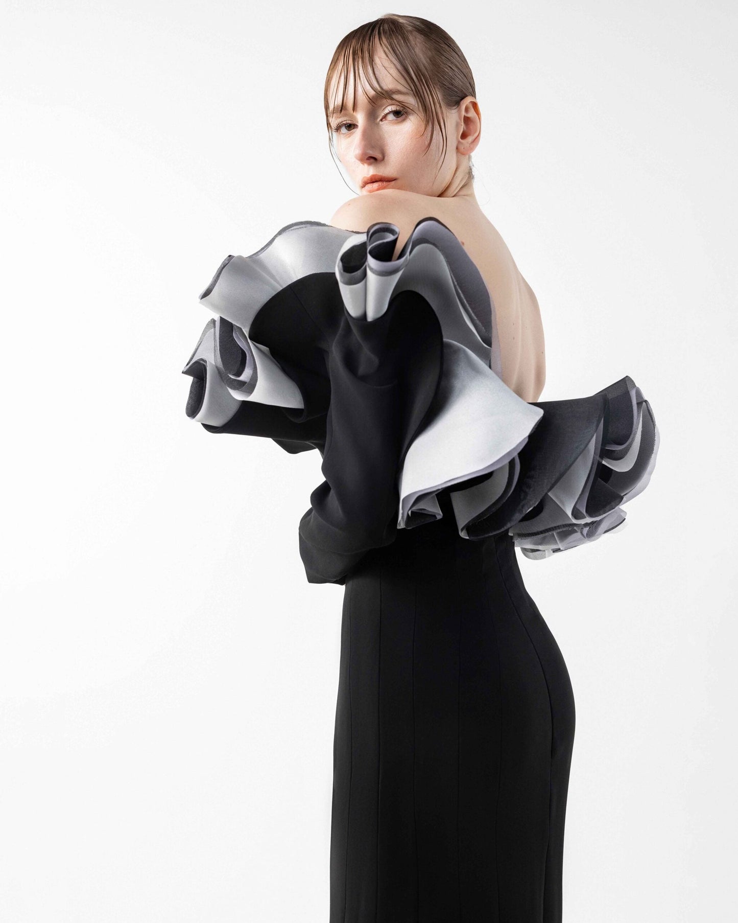 Romantic Black Gown with Sculptural Ruffles and Sleeves