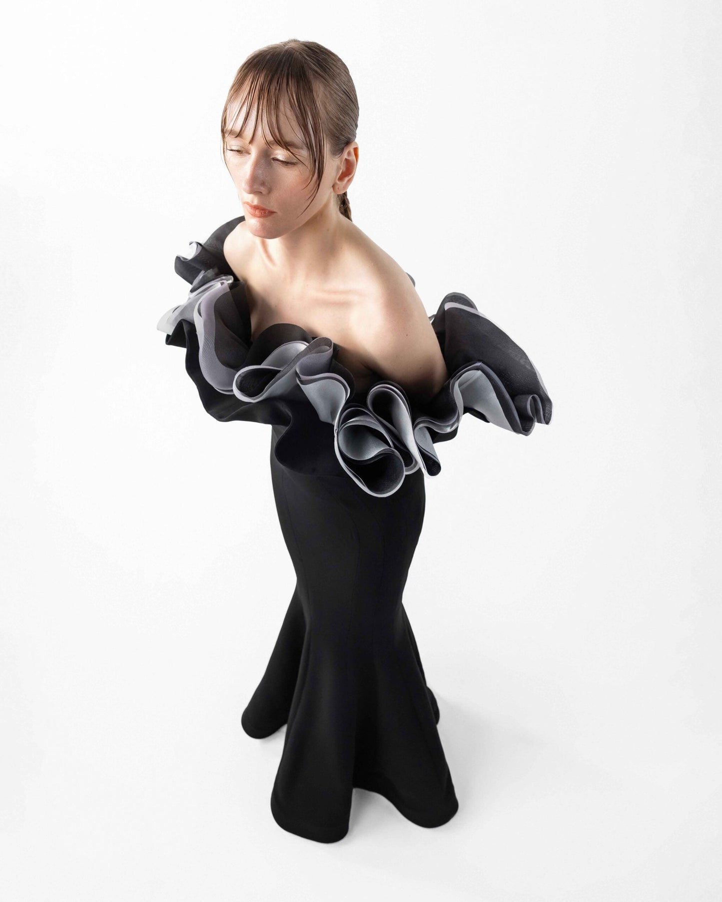 Romantic Black Gown with Sculptural Ruffles and Sleeves