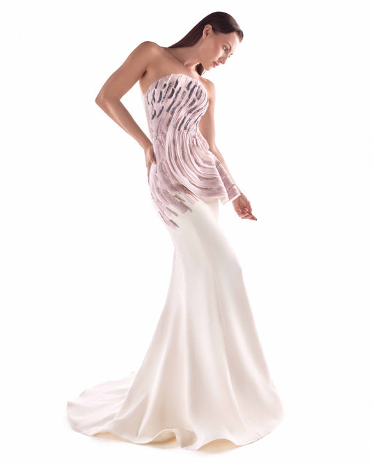 An Off-White Mermaid Silhouette Traced with Blush Embroidered Waves