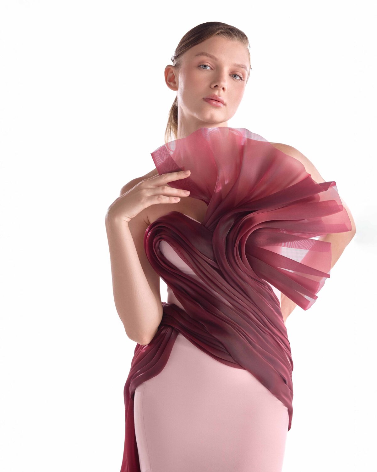 Fluid Crimson Flow on a Pink Crepe Evening Gown